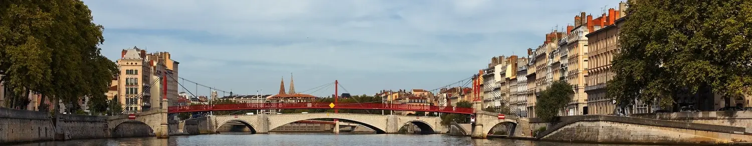Students collaborating in a modern classroom with laptops