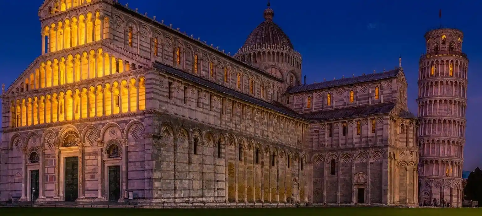 Students collaborating in a modern classroom with laptops